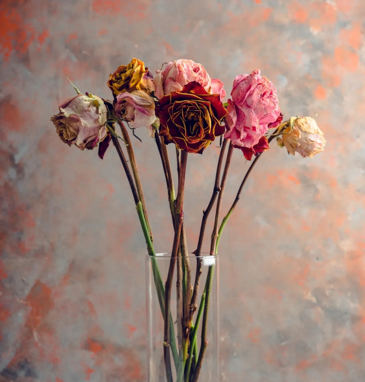Dried rose bouquet on a rustic background
